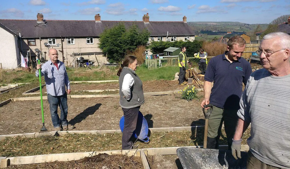 People taking part and working at the Corwen allotments as part of the Nature for Health project