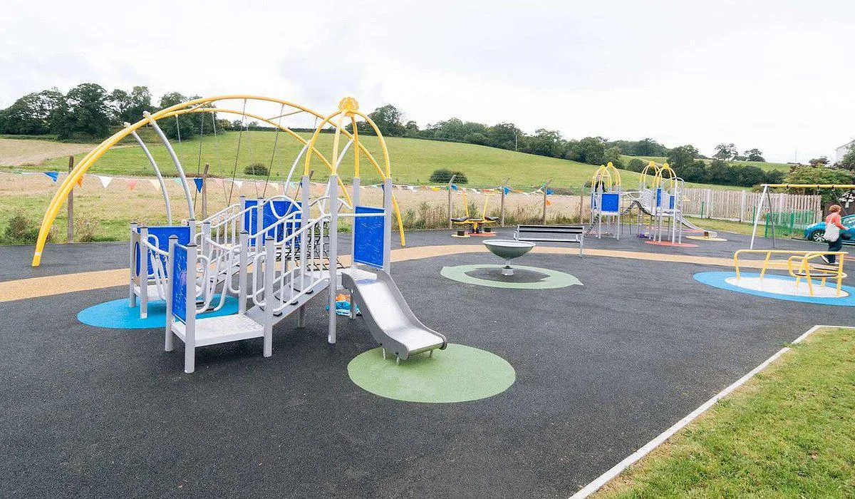 A new colourful play area with climbing frames, swings and slides in Ruthin