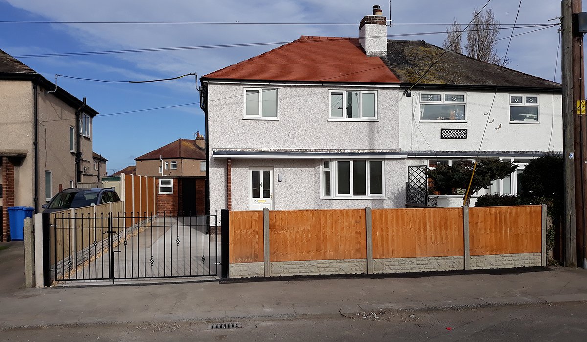 External enveloping scheme with new render and roof.
